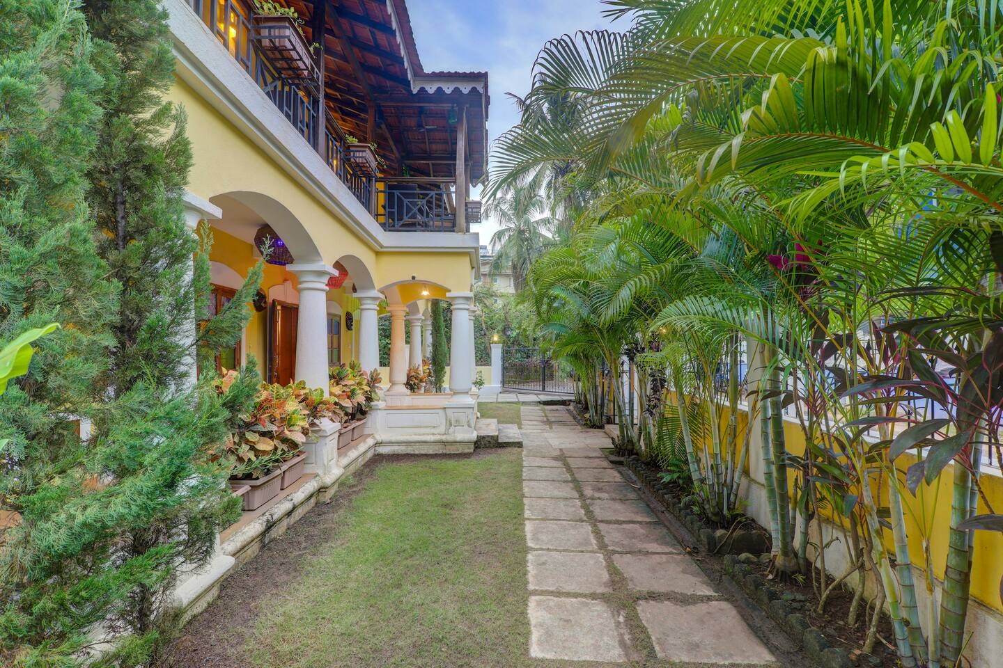 Garden walkway at House of Legends Villa, Saligao