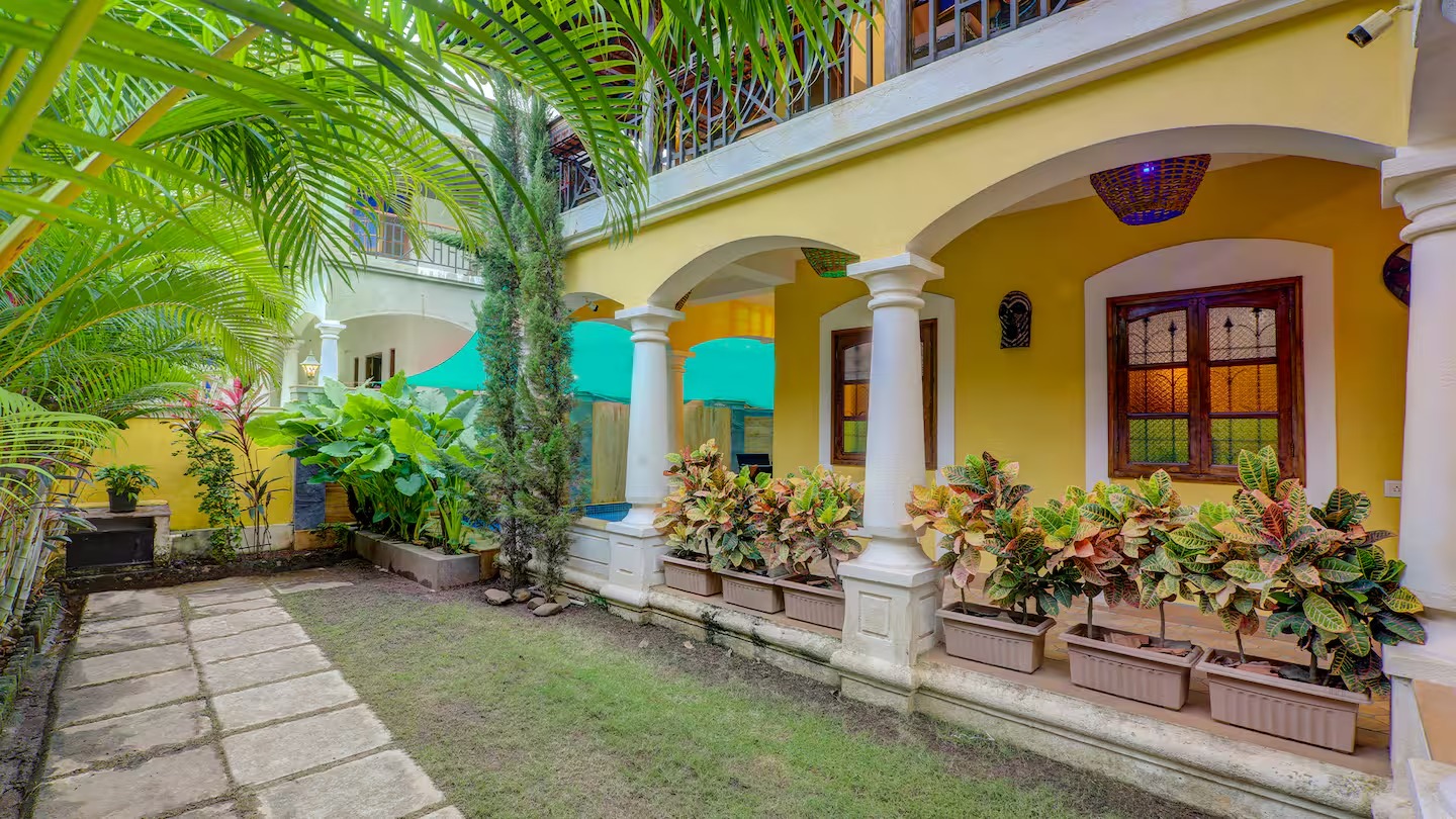 Garden and veranda at House of Legends Villa, Saligao